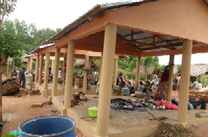 Rconstruction d'un march, Bnin